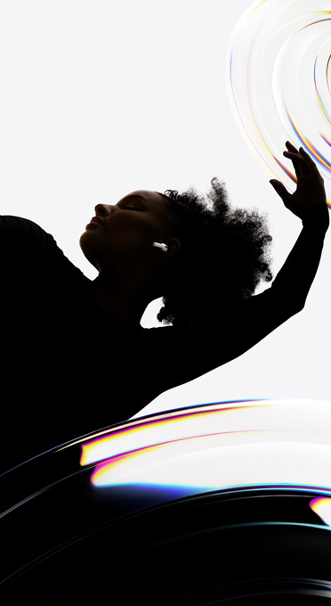 AirPods Pro 3 inserted in the ear of a dancer as they enjoy a hands-free listening experience