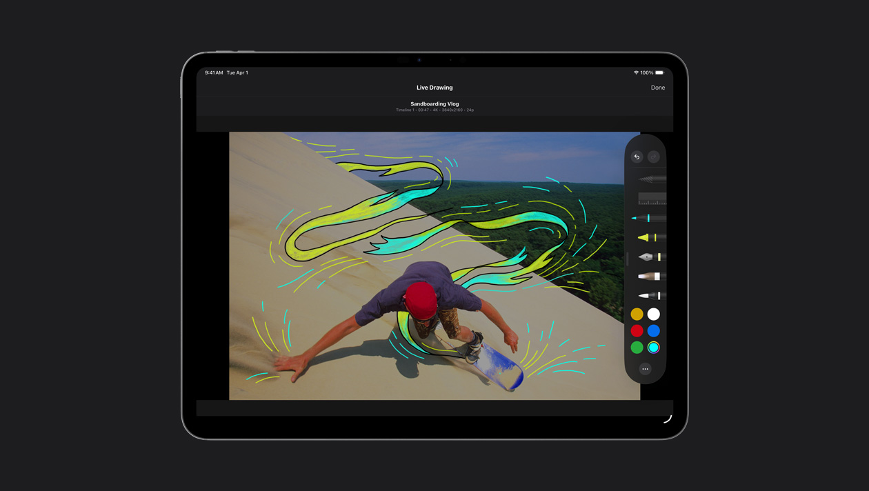 iPad Pro รุ่น 13 นิ้ว, นักสเก็ตบนเนินทรายที่มีเส้นแสดงการเคลื่อนไหวสีเหลืองและสีน้ำเงินอยู่รอบตัว, การสาธิต Live Drawing