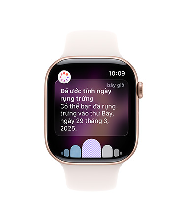 Apple Watch Series 11, aluminum case, rose gold color, ovulation date estimated notification, right side exterior: Digital Crown, light blush Sport Band